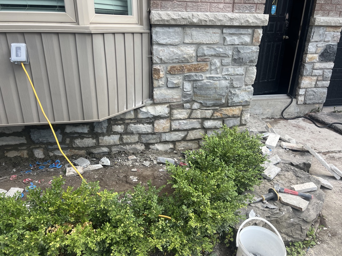 Stone masonry beside entrance